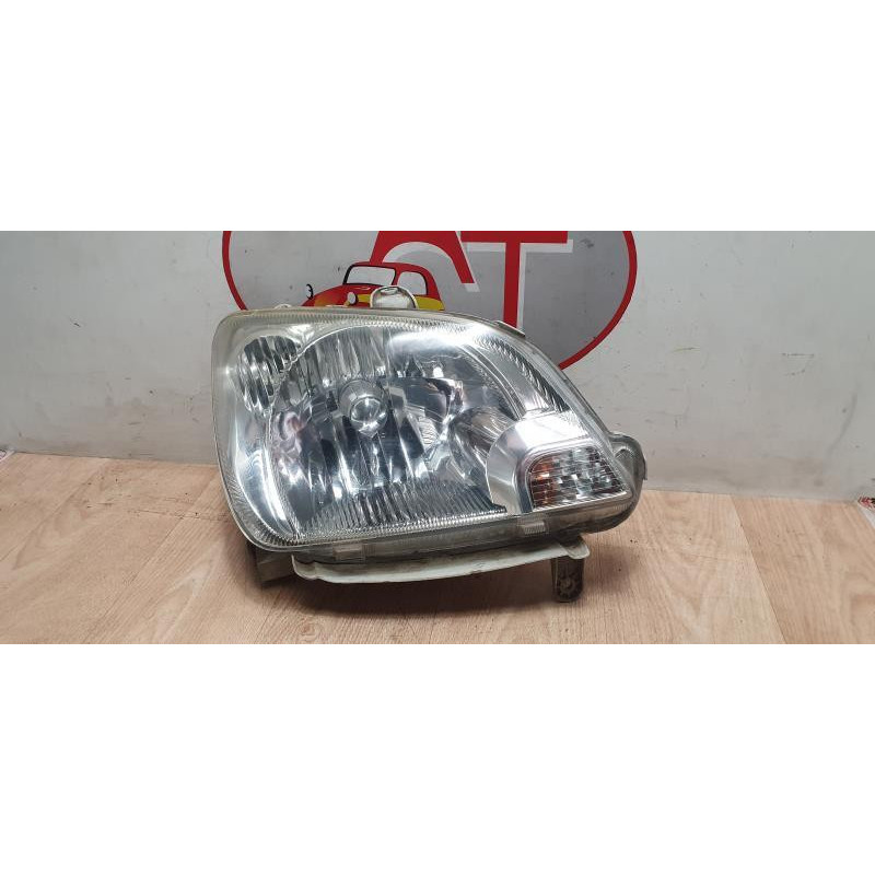 Optique avant principal gauche (feux)(phare) DAIHATSU  d’occasion